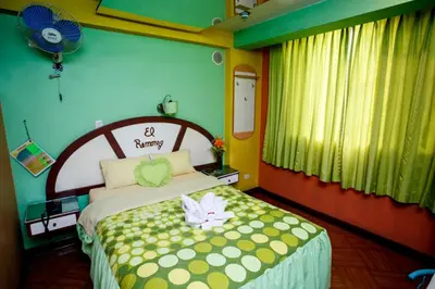 a bedroom with a bed with a flower on it at Hospedaje El Remanso in Lima