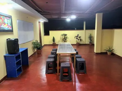 a conference room with a table and chairs in it at Private Apartment Close to Airport - Airport Shuttle Available in Lima