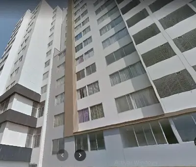 two tall buildings with windows in front of them at Departamento 4p en condominio Centro de Lima in Lima