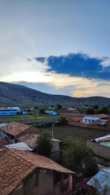 a view of a town with buildings and a train at Posada El Pino