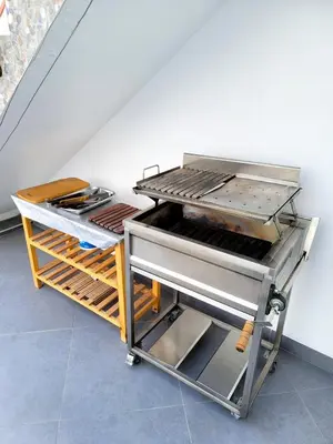 a grill sitting in the middle of a room at Casa Bujama Playa y Piscina Privada in Bujama Baja