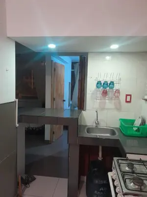 a kitchen with a counter top and a sink at Minidepa San Bartolo in San Bartolo