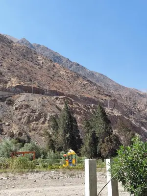 a mountain with a fence in front of a hill at Casa de Campo en Santa Rosa de Quivez in Santa Rosa de Quives
