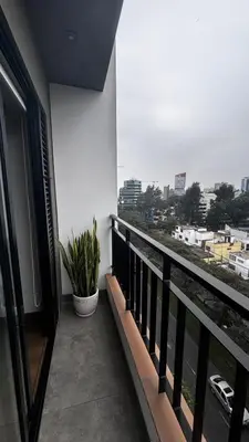 a balcony with a view of a city at Apartment in Lima close to everything in Lima