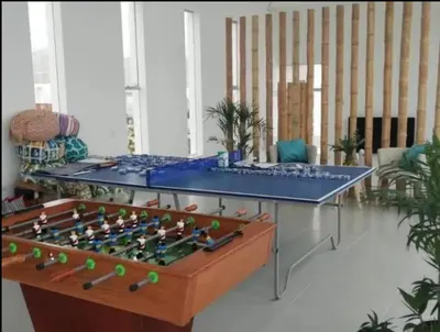 a chess board on a table in a room at Casa de Playa en Puerto Viejo, Condominio Kalua in San Antonio