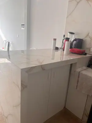 a white counter top in a room with a counter top at Departamento 101 in Punta Negra