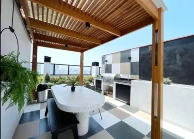 a kitchen with a white table and a checkered floor at Cozy apartment, downtown area, fully equipped in Lima