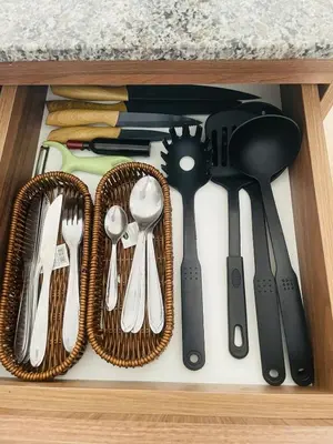 a drawer filled with utensils in a kitchen at Apartamento moderno en Miraflores in Lima