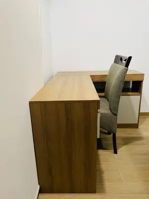 a wooden desk with a chair in a room at Apartamento moderno en Miraflores in Lima