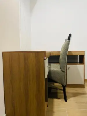 a wooden desk with a chair in front of it at Apartamento moderno en Miraflores in Lima