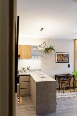 a kitchen with a counter top in a room at 5 stars Stylish Andean Stay - CUSCO in Cusco