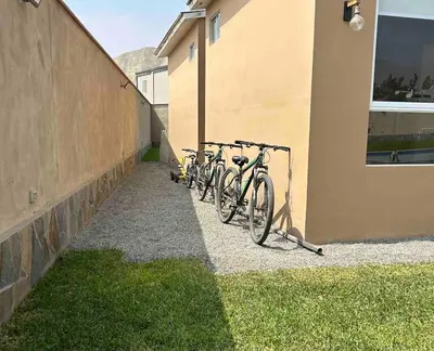 a group of bikes parked next to a building at Casa Cieneguilla in Cieneguilla