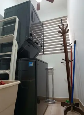 a laboratory with a machine and a cross in a room at Costanera Tourist Free Parking 3B 708 in Lima