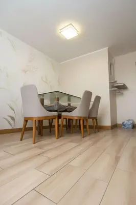 a dining room with a table and four chairs at Costanera Tourist Free Parking 3B 708 in Lima