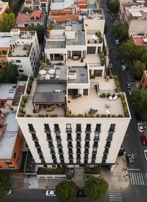 an aerial view of a building in a city at E Free Parking Patio Privado Barranco 1B 109 in Lima