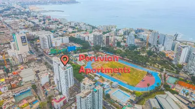 an aerial view of a city with the words peruvian apartments at Peruvian Apartments Barranco 1404 in Lima