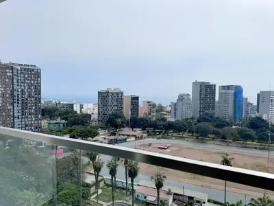 a view of a city skyline with tall buildings at Peruvian Apartments Barranco 1404 in Lima