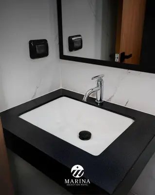 a black and white sink in a bathroom at Marina Selection Hotel in San Juan de Marcona