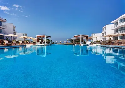a large pool with blue water in a hotel at VPX Hotel in Asia