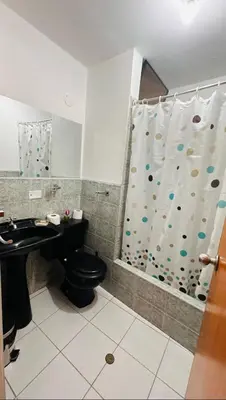 a bathroom with a shower with a toilet and a sink at DEPARTAMENTO Chincha City 1 in Chincha
