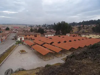 an overhead view of a group of buildings with orange roofs at Hospedaje Encanto de Chinchero in Chinchero