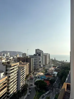 a view of a city with buildings and a street at Acogedor departamento en Malecón Balta con Piscina in Lima