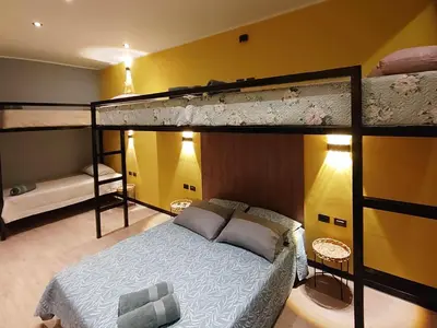 a bedroom with two bunk beds in a room at Quiet 4BR Villa with Pool & Terrace in Ica