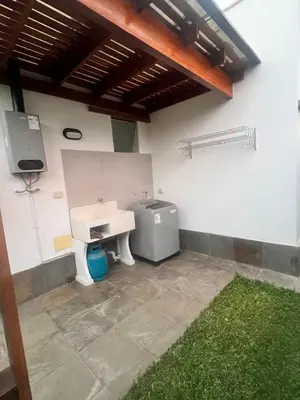 a bathroom with a sink and a toilet at Condominio ecológico las gardenias de Asia in Asia