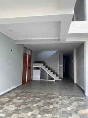 an empty hallway with stairs in a building at Ruta del Oasis - Huacachina in Ica