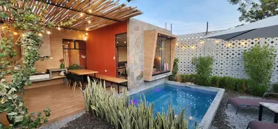 a small swimming pool in the backyard of a house at Quiet 3BR Country Villa whit BBQ in Ica