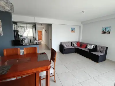 a living room with a couch and a table at San bartolo 2 in San Bartolo