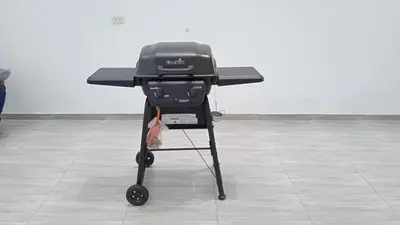 a charcoal grill sitting on a table in a room at Duplex - Playa Embajadores in Quebrada Seca
