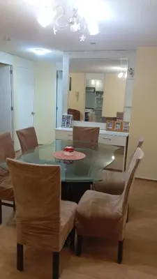 a dining room with a glass table and chairs at Welcome to this apartment Pet friendly in Lima