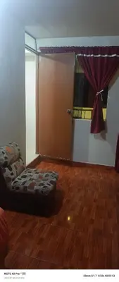 a room with a bed in the middle of a room at AMARU Palace in Machu Picchu