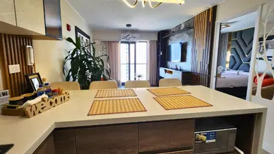 a kitchen with a island in a room at Luxury Ocean View Barranco Apt, 17th Floor AC in Lima