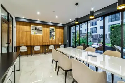 a large dining room with a long table and chairs at Luxury Ocean View Barranco Apt, 17th Floor AC in Lima