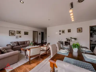 a living room with a couch and a table at Cozy Retreat in the Heart of Surco in Lima