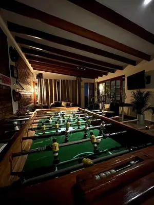 a room with a pool table in a room at Casa de Campo Quives Majestuoso 5BR in Santa Rosa de Quives