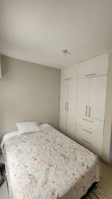 a bedroom with a bed and a white cabinet at Apartment in San Bartolo - Playa Norte in San Bartolo