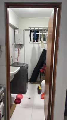 a small bathroom with a sink and a microwave at Apartment in San Bartolo - Playa Norte in San Bartolo