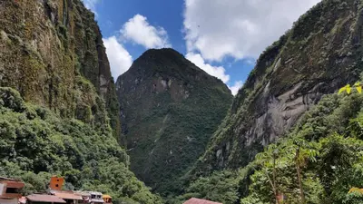 a view of a canyon with trees and mountains at Hostal Vista Waynapata 123 in Machu Picchu