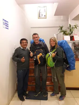 a group of three people posing for a picture at Hospedaje el Telar in Nazca