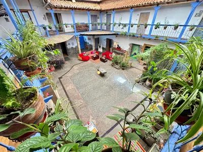an aerial view of a courtyard in a house with plants at ARQUEOLOGO Exclusive Boutique Hotel Cusco - Centro Histórico in Cusco
