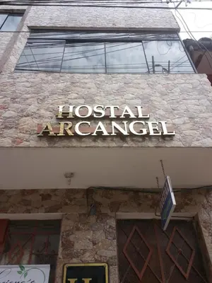 a hospital emergency sign on the side of a building at Hostal Arcangel in Abancay
