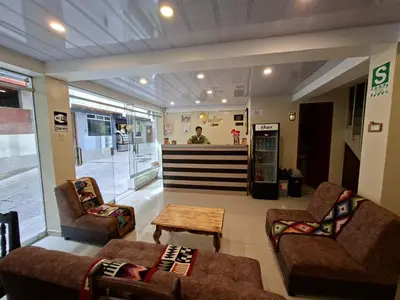 a lobby with two couches and a coffee table in a store at Andino Classic in Machu Picchu