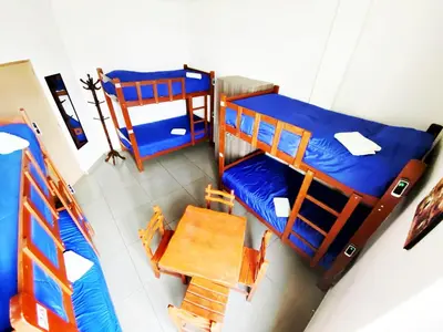 an overhead view of a bedroom with two bunk beds at Lima House Hostel in Lima