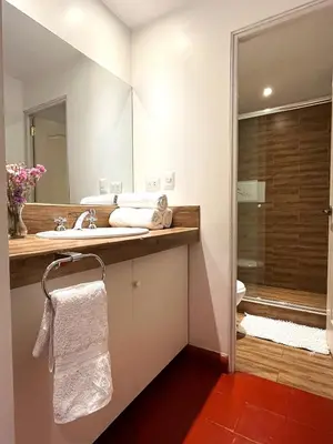 a bathroom with a sink and a shower at Usgar San Pedro Boutique in Cusco