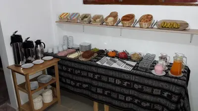 a table with a buffet of food on it at Inkas Land in Machu Picchu