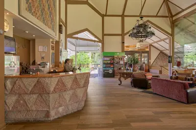 a lobby of a store with a bar in the middle at Casa Andina Premium Valle Sagrado Hotel & Villas in Urubamba