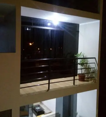 a balcony with a view of a city at Maudi Lodging in La Merced